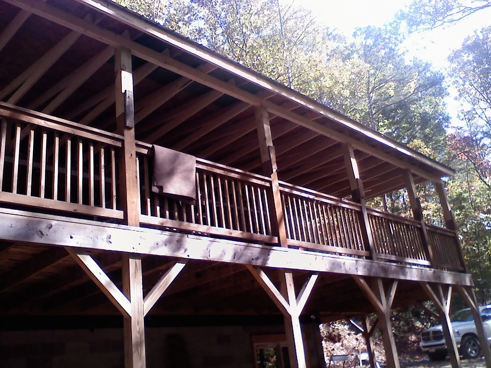 Timber framing under a new elevated porch and deck — Roof Leak Repair in Damascus by Roofing Brothers